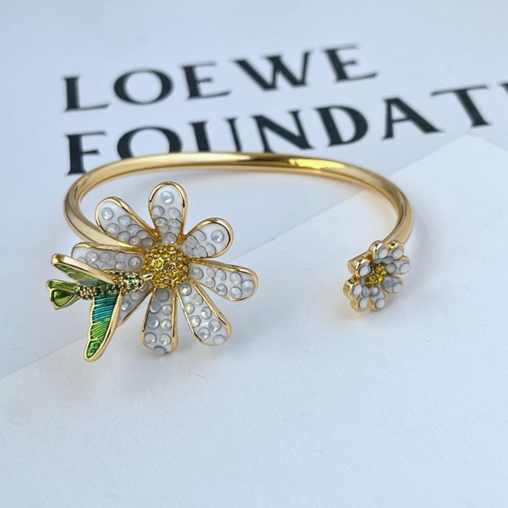 kate spade Gold and White Flower Bracelet